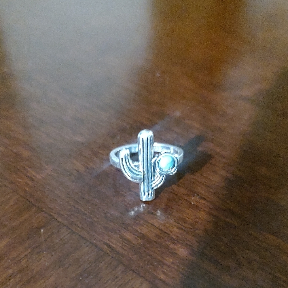 Artistic Silver Ring with Turquoise Detail